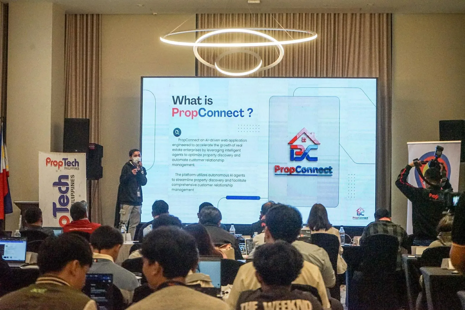 Pitching PropConnect on stage at the Sinulog PropTech Hackathon